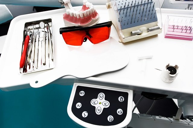 Equipment and dental instruments in dentist's office. Tools clos